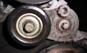 Натяжной ролик (натяжитель) Opel Astra 1.6 16V (H) 2004-2010 55563512 11526