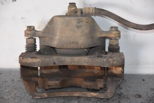 Супорт передній правий -08 Hyundai Tucson 2004-2009 581301F000 87430 - 2