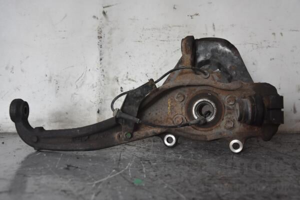 Поворотний кулак лівий з ABS в зборі ступиця Nissan Navara 2005-2015 40015EB000 104771 - 2