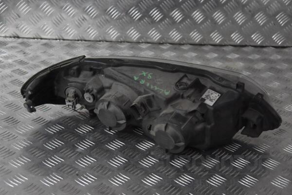 Фара ліва (03-) Nissan Almera (N16) 2000-2006 26060BN67A 110679 - 2